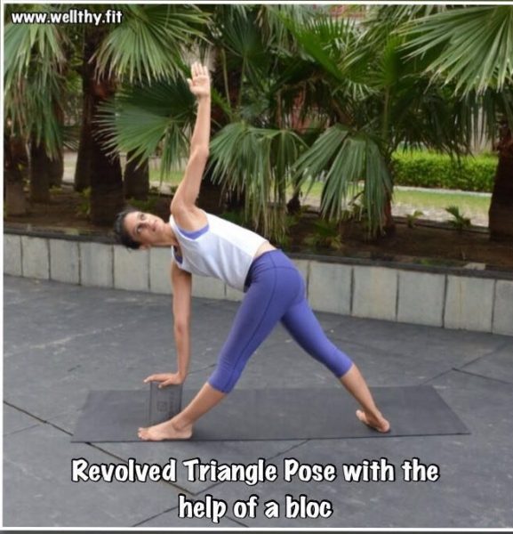 Revolved Triangle Pose with the help of a block